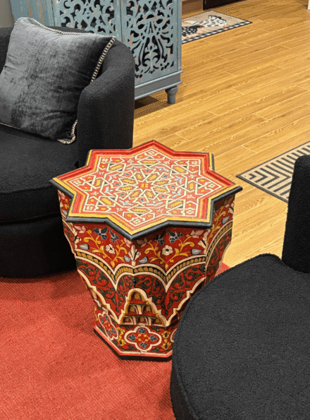 handmade Moroccan side tables and coffee table with carved wood details